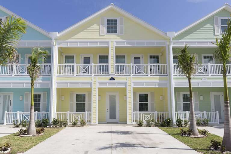 Front exterior of our home. Unit B is the yellow townhome.