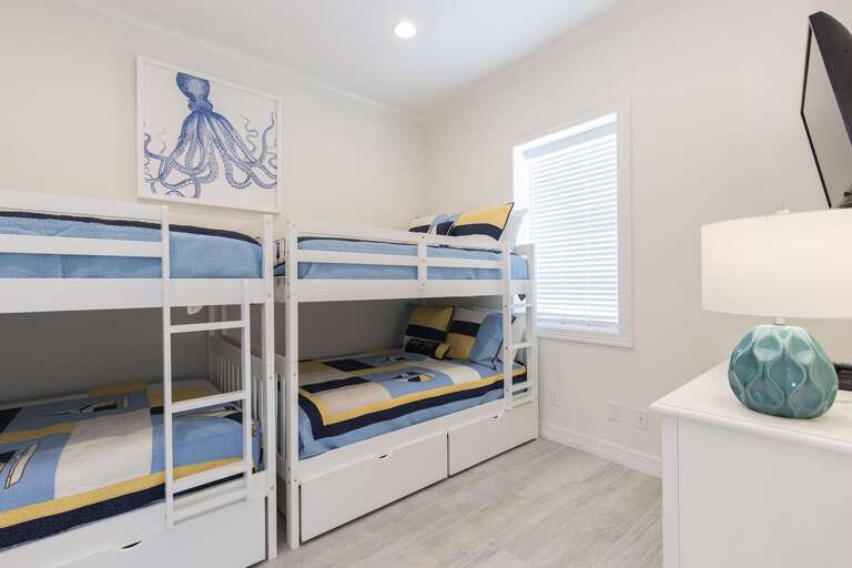 Downstairs bedroom #1 with two full size bunk beds!