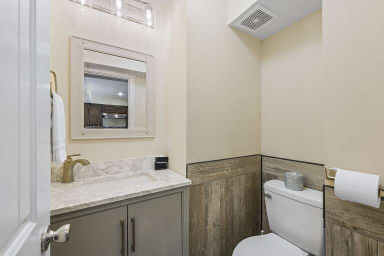 Ground floor suite has a half bathroom just off the pool area!