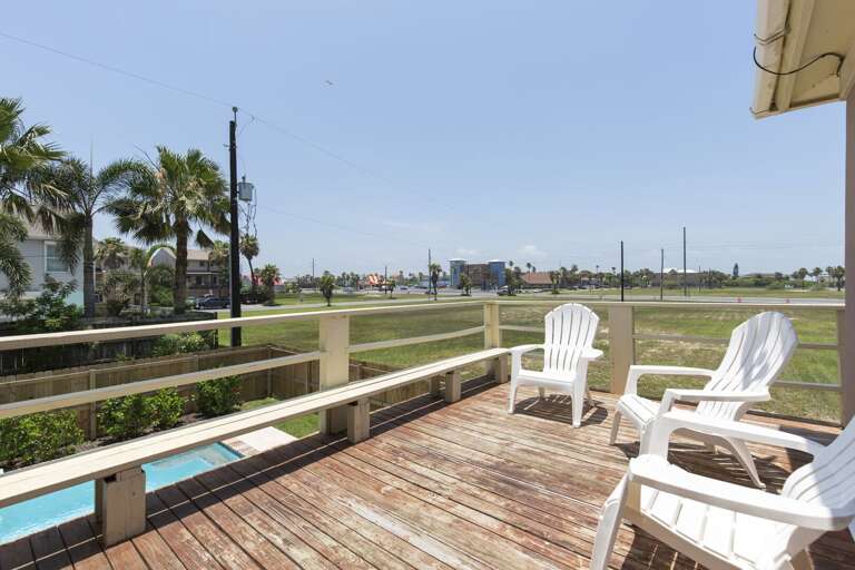 Relaxing balcony facing the pool!
