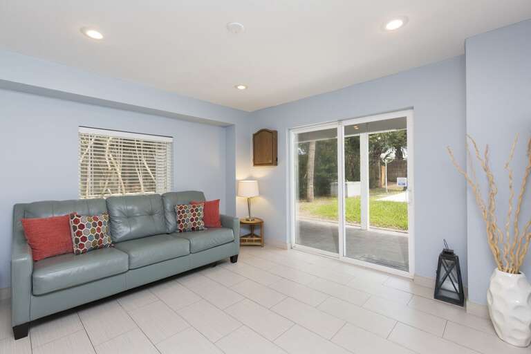 Downstairs living area and wet bar. This room is located just off the pool area and is attached to the 3rd and 4th bedrooms.