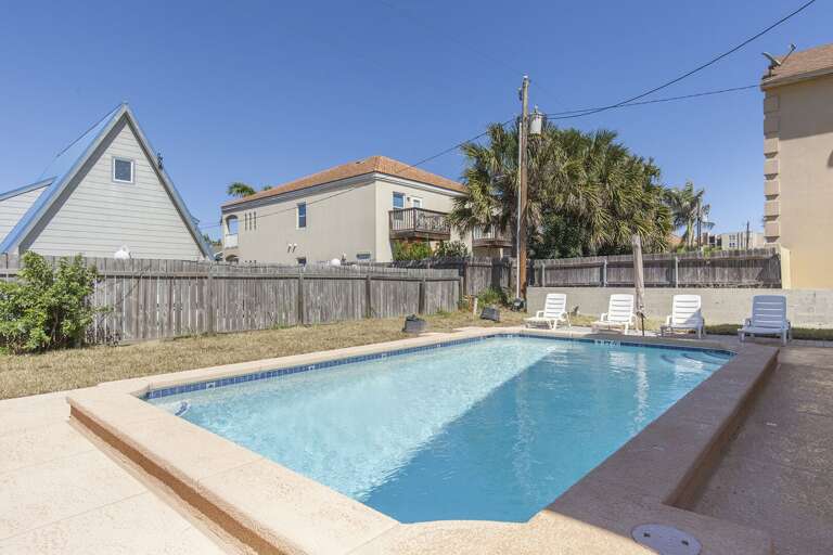 Cool off in your private heated pool after a day of fun on South Padre Island.