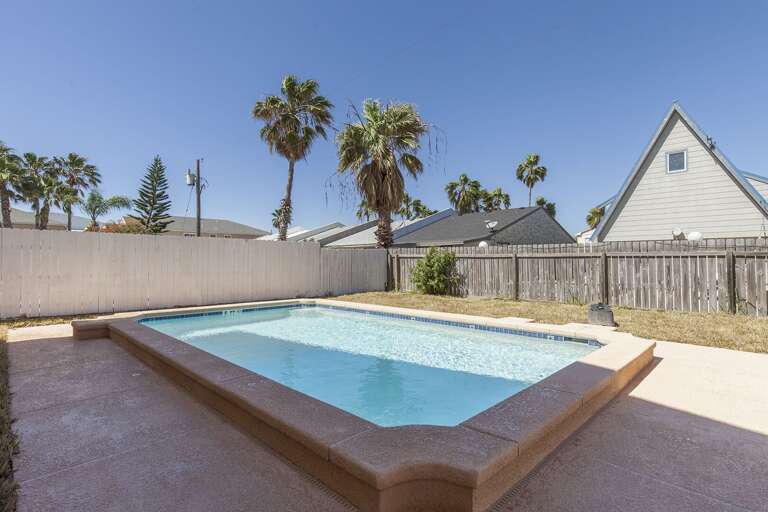 Relax poolside with plenty of space for lounging in the South Padre Island sunshine.