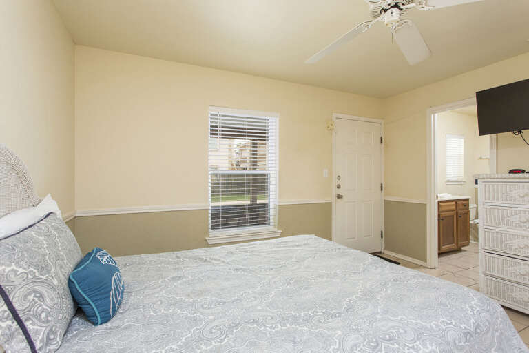 Bedroom #3 & flat screen TV. This has direct access to the pool area!