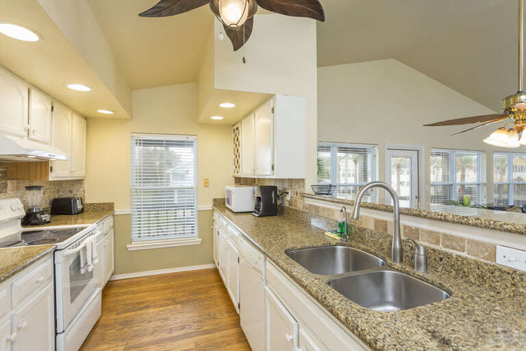 Kitchen is fully stocked with pots, pans, utensils and dishware for your convenience. Kitchen is fully stocked with pots, pans, utensils and dishware for your convenience.