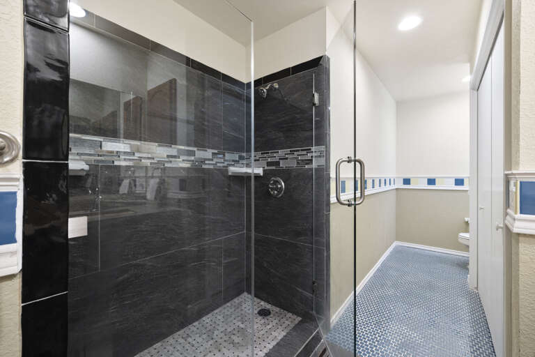 Spacious Master bathroom with tiled walk-in shower and double vanity sinks! Spacious Master bathroom with tiled walk-in shower and double vanity sinks!