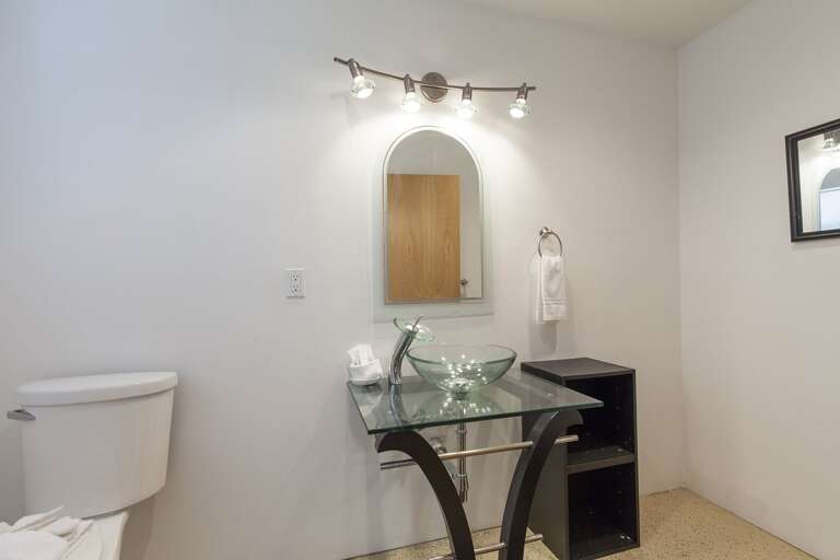 Half bath attached to guest bedroom 4.