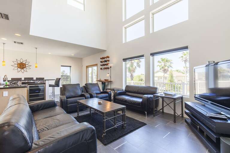 Large open concept living, dining and kitchen areas.