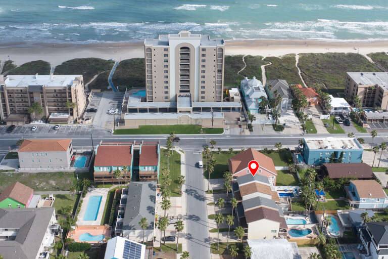 Aerial view of the property and beach Aerial view of the property and beach