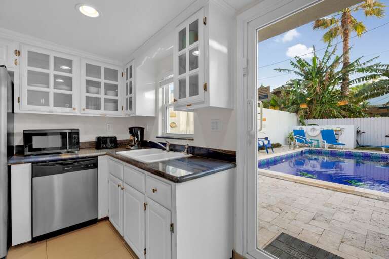 Kitchen Area with direct pool access Kitchen Area with direct pool access