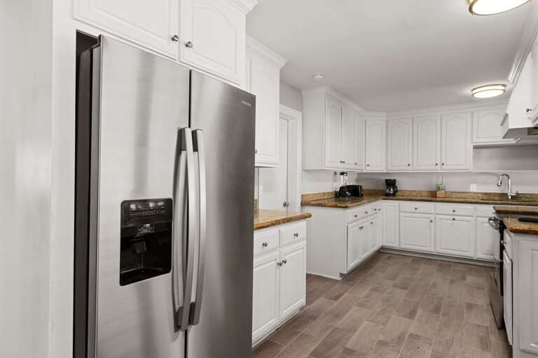 Large kitchen with stainless steel appliances