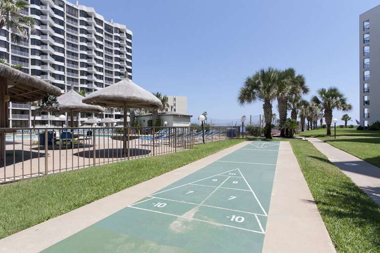 Add a little friendly competition to your vacation with a game of shuffleboard.