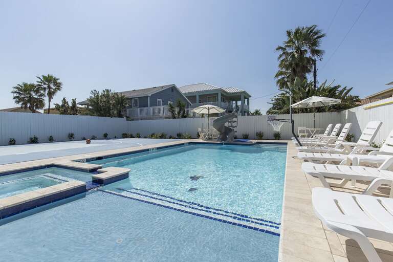 Enjoy the island breeze by the private heated pool!