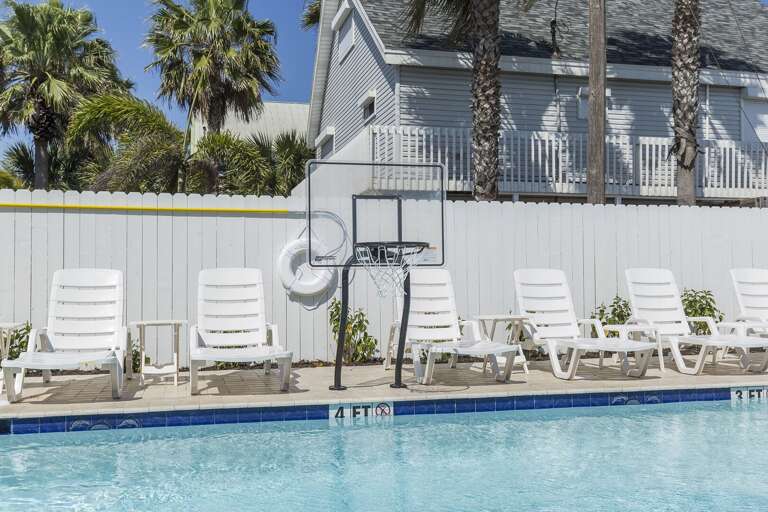 Pool basketball in this one of a kind beach house.
