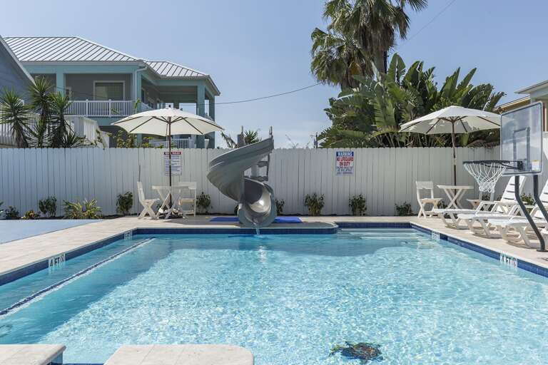 Slide in and splash into the private heated pool!