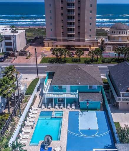 Vacation paradise! Beach view, largest pool, water slide, hot tub, tanning shelf, basketball court, pool side basketball rim, spacious balcony (enjoy firework from north and south side).