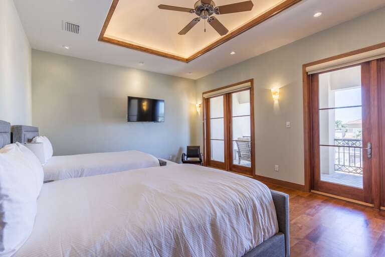 3rd floor guest bedroom with 2 full beds.