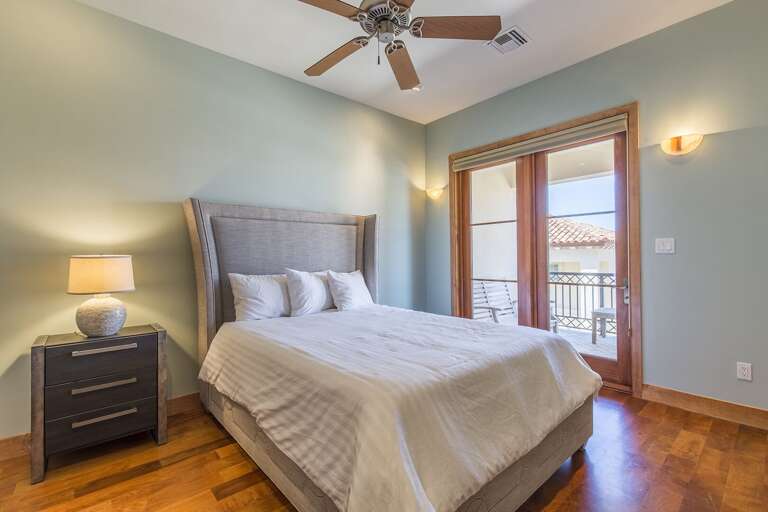 Guest room with queen bed and flat screen tv