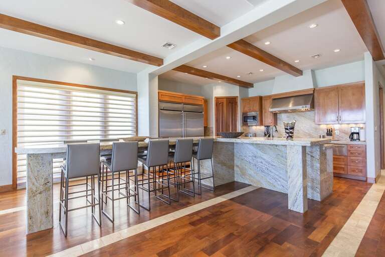 The kitchen offers a large seating area with a granite countertop! Its a huge Wow facto