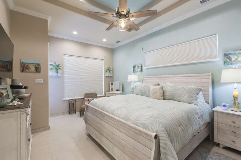 Second floor bedroom with a queen bed (streetside)