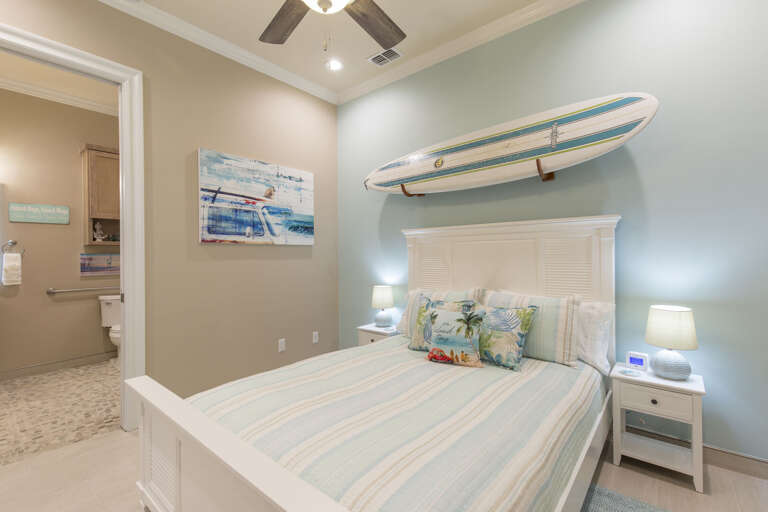 Ground floor guest bedroom with a queen bed