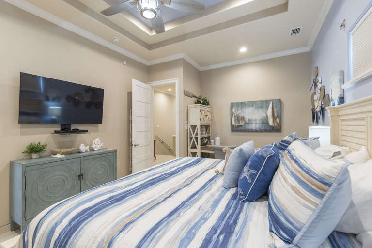 Master bedroom with 4K TV