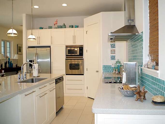Kitchen features stainless steel appliances