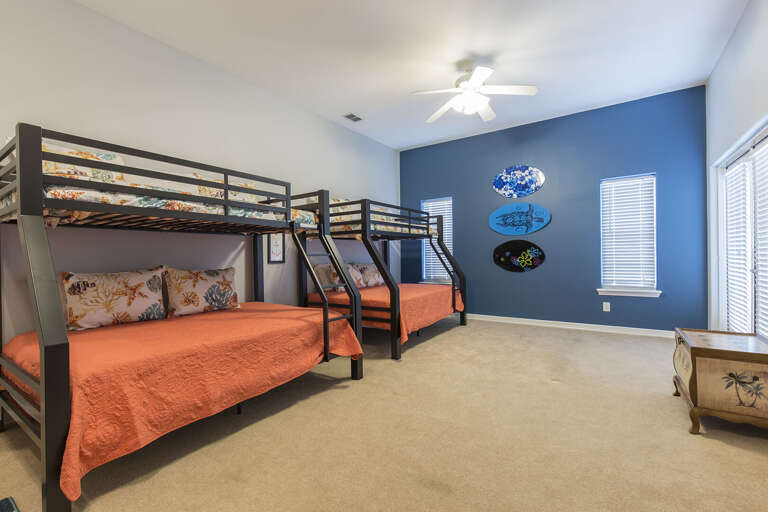 Second floor guest bedroom with 2 sets of bunk beds.