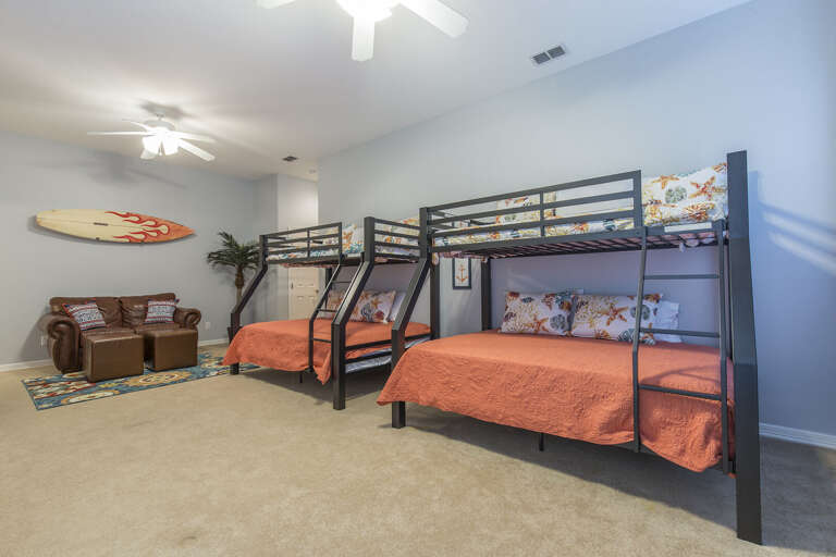 Second floor guest bedroom with 2 sets of bunk beds. Twin tops and Full size bottoms.