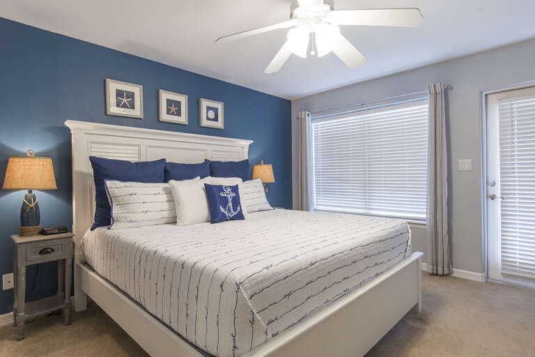 Third floor master suite with a king bed.