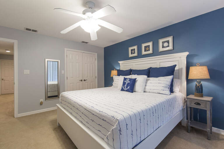 Third floor master suite with a king bed.