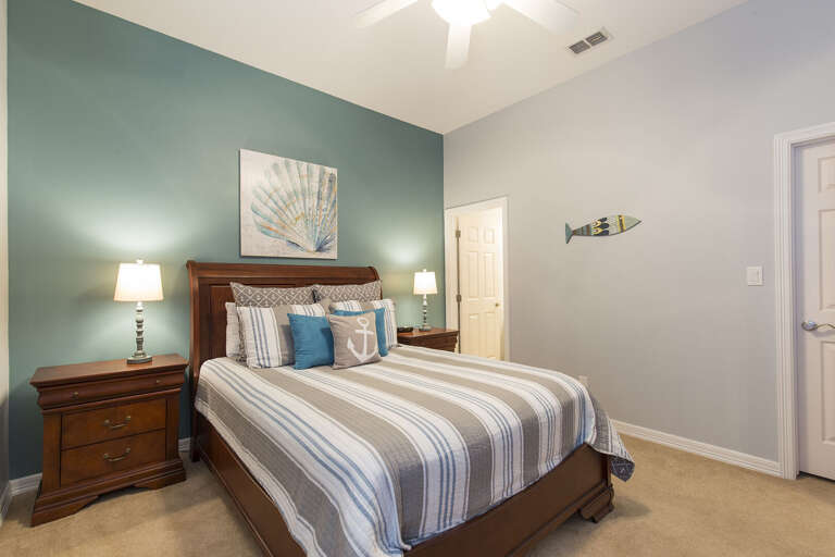 Guest bedroom with a queen bed.