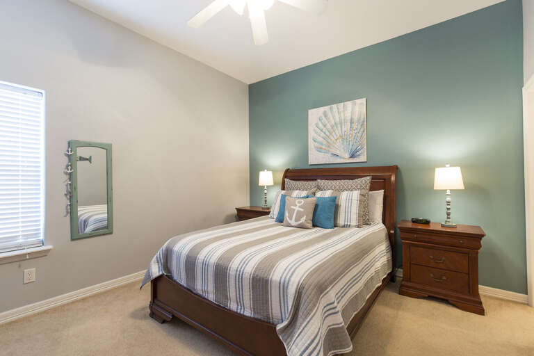 Guest bedroom with a queen bed.
