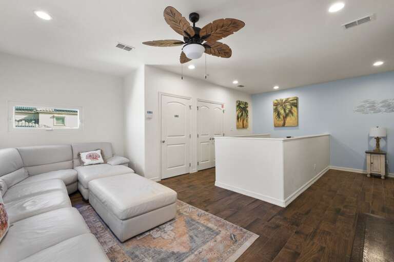 3rd floor family room with flat screen TV.