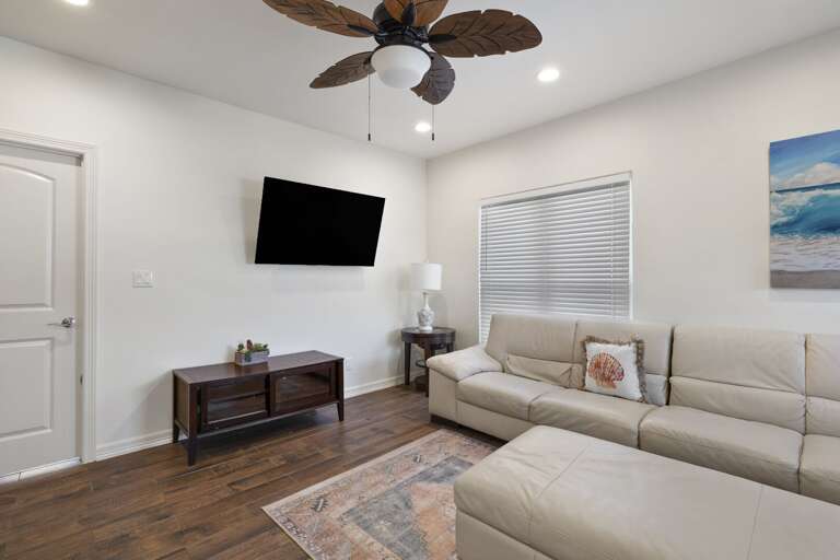 3rd floor family room with flat screen TV.