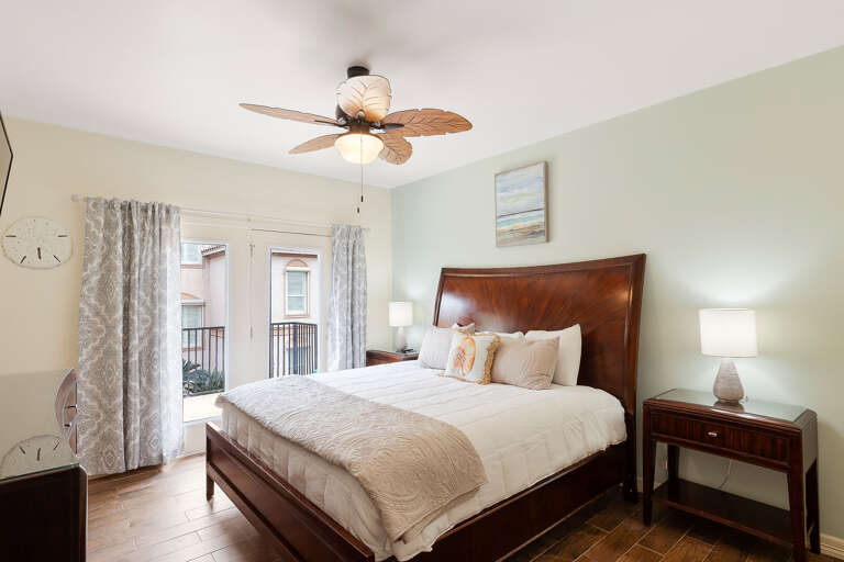4th guest bedroom with King size bed and flat screen TV. Balcony access from this room as well.