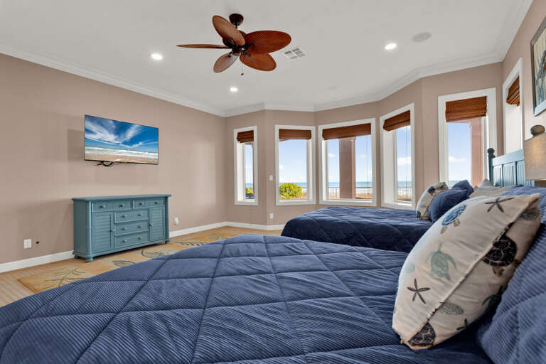 Ground floor Master Bedroom with 2 Queen beds & ensuite bathroom.