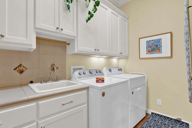 Laundry room with washer & dryer, plus a rinse sink!