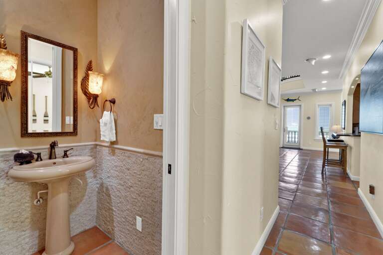 Shared half bathroom.