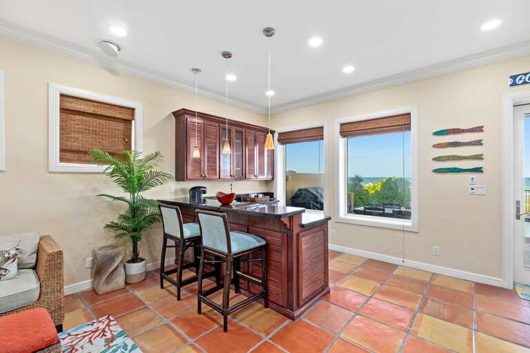 Wet bar/kitchenette on the ground floor, just off the pool & patio area.