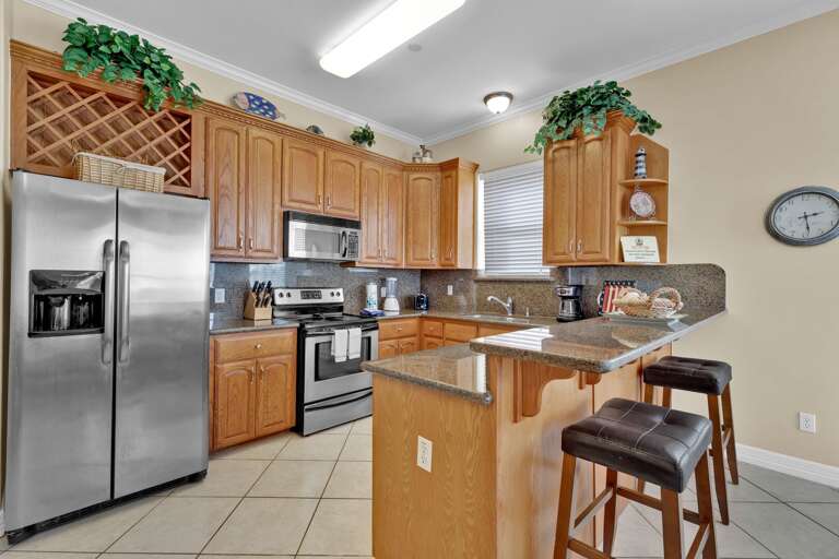 Ample fully equipped kitchen.