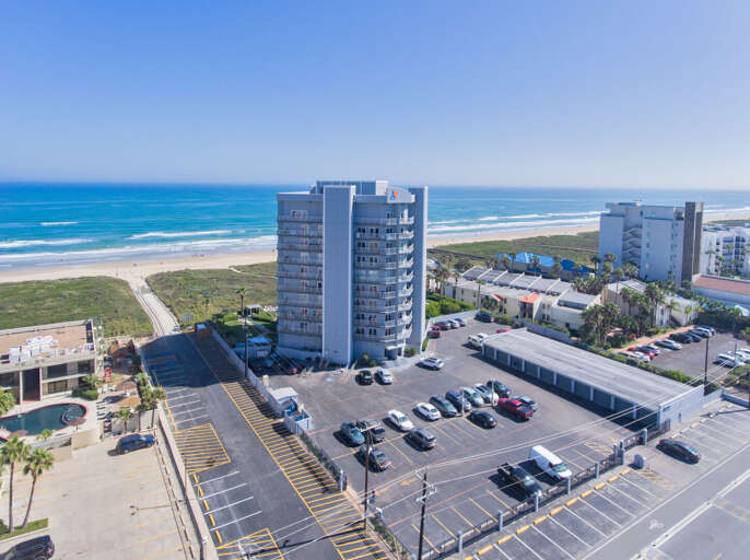 Aerial view of the Aquarius Condominiums. secure, gated parking lot (1 vehicle.)