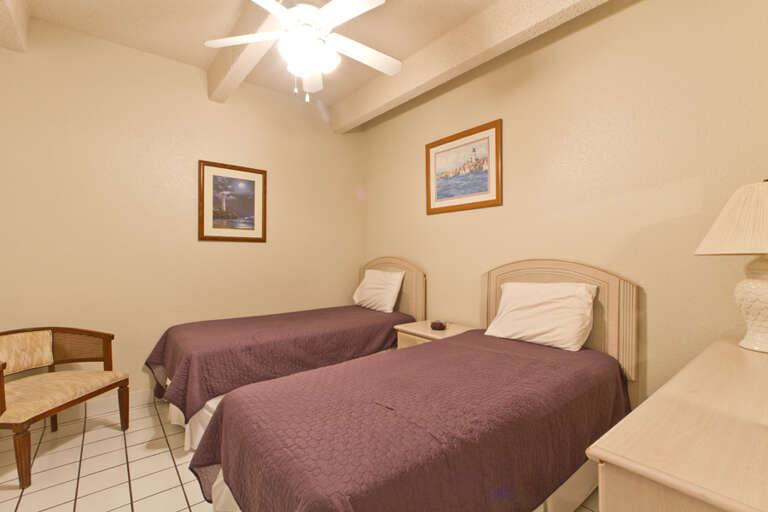 Guest bedroom with two twin beds.