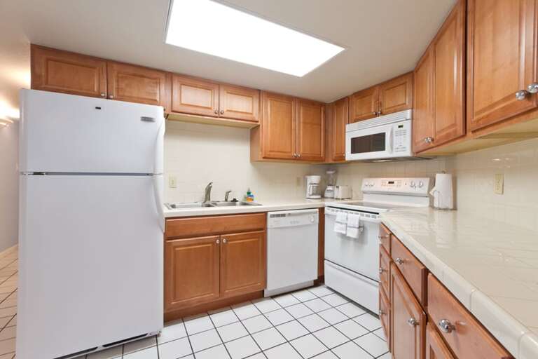 Kitchen is fully stocked with pots, pans, & dishware for you to use.