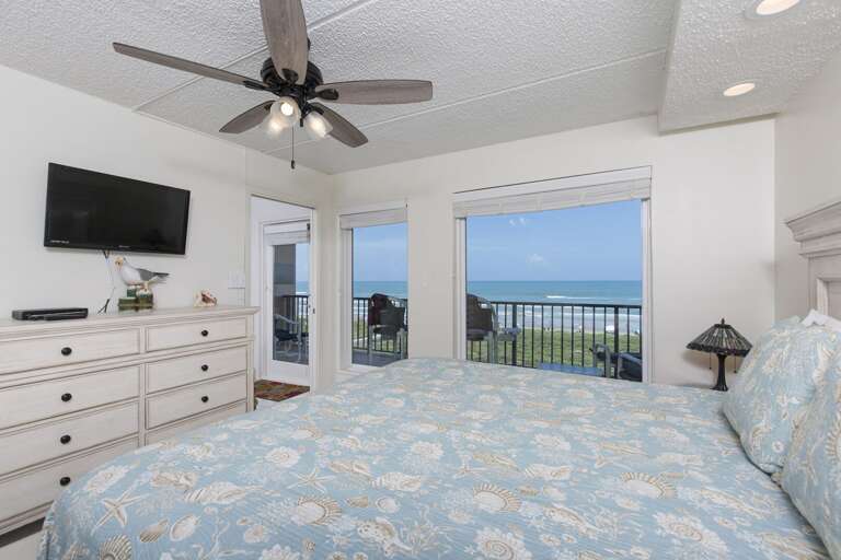 Master bedroom with king bed Master bedroom with king bed