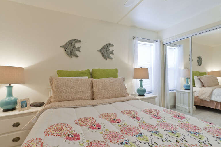 Bedroom with queen size bed.