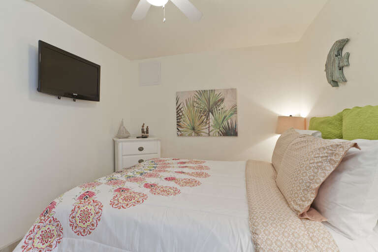 Bedroom with queen size bed.