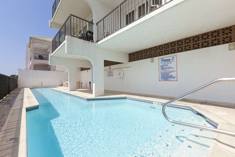 Pool with views to the beach.