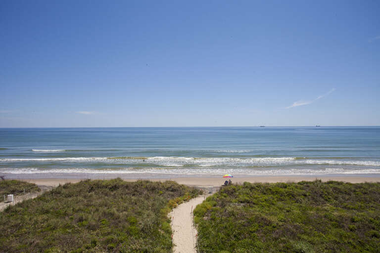 Private beach access from building complex