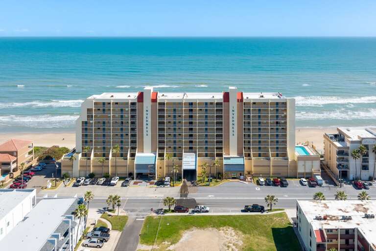 The oceanfront Inverness Condominiums features a large private pool, two hot tubs, and endless views of the Gulf!